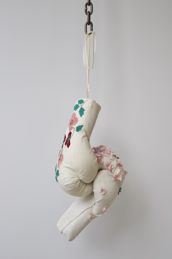 F___dom, 2019
2 boxing gloves, vintage linen, chain
25 x 7 x 8.5&amp;nbsp;inches