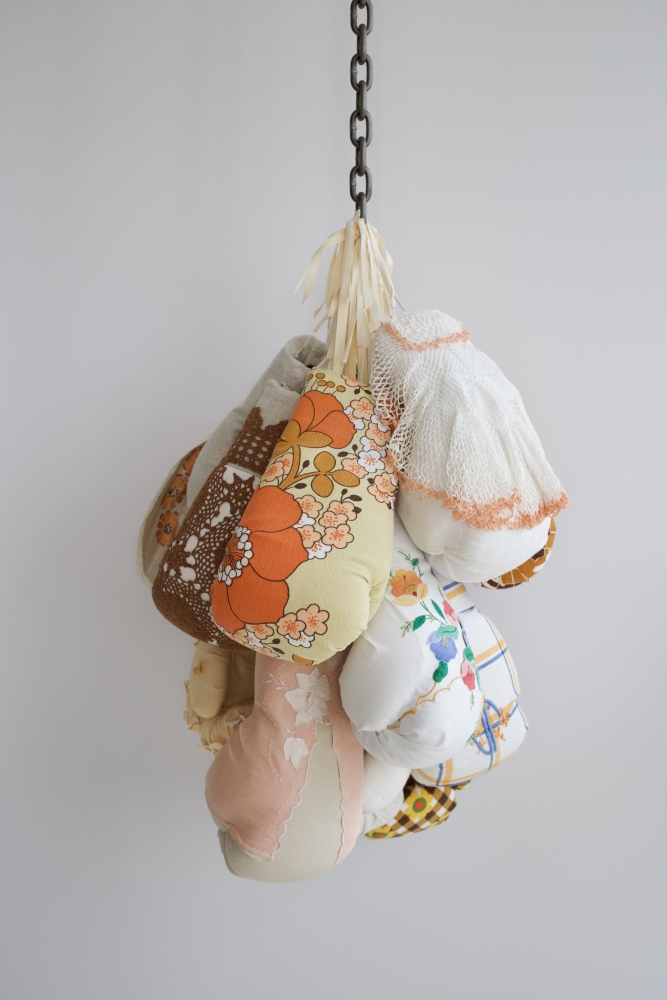 According To Grandma, 2019
12 boxing gloves, vintage linen, chain
29 x 19 x 15.5&amp;nbsp;inches